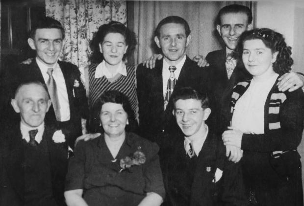 Glasgow Times: Bobby Dinnie, at right on bottom row pictured with his family - parents Jock and Betty, and his siblings George, Betty, Jim, Hugh and Agnes. 